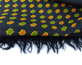 His or Her buttery soft silk oblong neck scarf. Small leaf icon design in green & gold. Classic styling. Comes packaged as a gift.