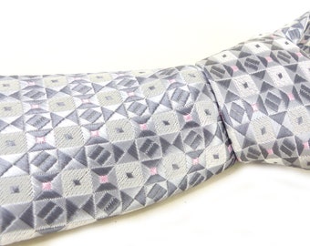 Classic & beautiful Jon Vandyk woven silk necktie in several shades of gray with little pink square details. Hand made in Holland.