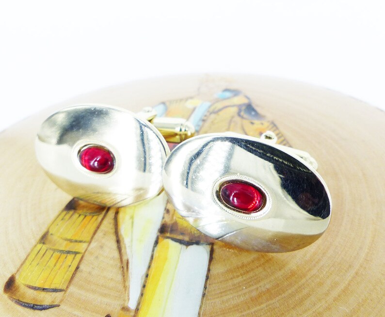 Gold setting with polished red glass center design Vintage oval cufflinks Classic Don Draper