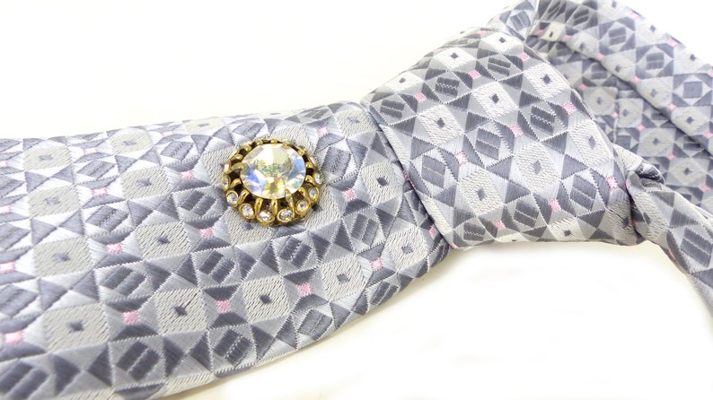 Classic /& beautiful Jon Vandyk woven silk necktie in several shades of gray with little pink square details Hand made in Holland.