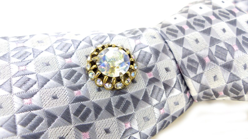Classic /& beautiful Jon Vandyk woven silk necktie in several shades of gray with little pink square details Hand made in Holland.