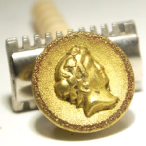 Miniature art Circa. 1900&#39;s Antique Victorian &quot;Grecian Profile&quot; gold brass design upcycled a magnetic pin with a silk covered back button.