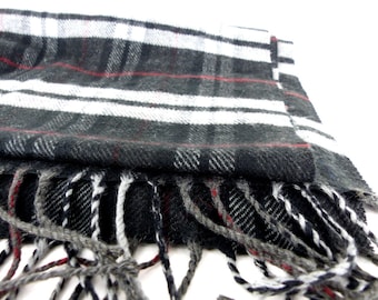 Buttery soft His or Hers Gorgeous soft plaid oblong muffler neck scarf. Timeless plaid in black, gray & dark red. Tassel ends