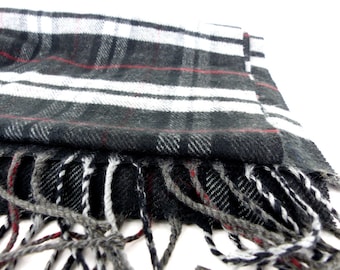 Buttery soft His or Hers Gorgeous cashmere soft plaid oblong muffler neck scarf. Timeless plaid in black, gray & dark red. Tassel ends