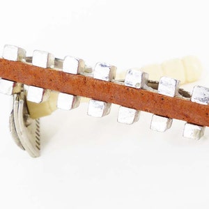 SWANK Tie bar or tie clip with a cool raised grid design in silver with leather strip inset, kind of a techie look. Free gift packaging