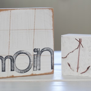 Arte de texto na parede “moin” e mini “âncora”