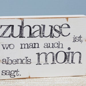 Imagem de texto na parede "Home"