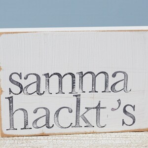 Imagem de texto na parede "samma hackts"