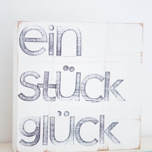 Wort Bild an der Wand ein stück Glück Bild 2