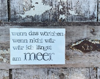 Text picture on the wall "wörtchen wenn"