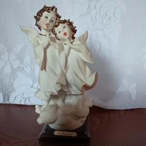 Singing Angels by Giuseppe Armani