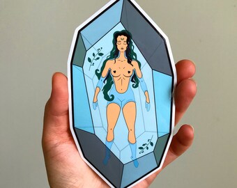 3" x 6" semi-transparent witchy / pagan sticker "Crystal Goddess" with Goddess floating inside a crystal surrounded by magical herbs.