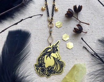 Gold & Black Necklace No.10 with unicorn pendant and star charms. Gold plated accent findings, 24" black stainless steel chain.