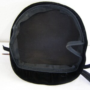 Vintage 1950's women's millinery hat. Black velvet or velour cocktail style with feather and silk flower. image 3