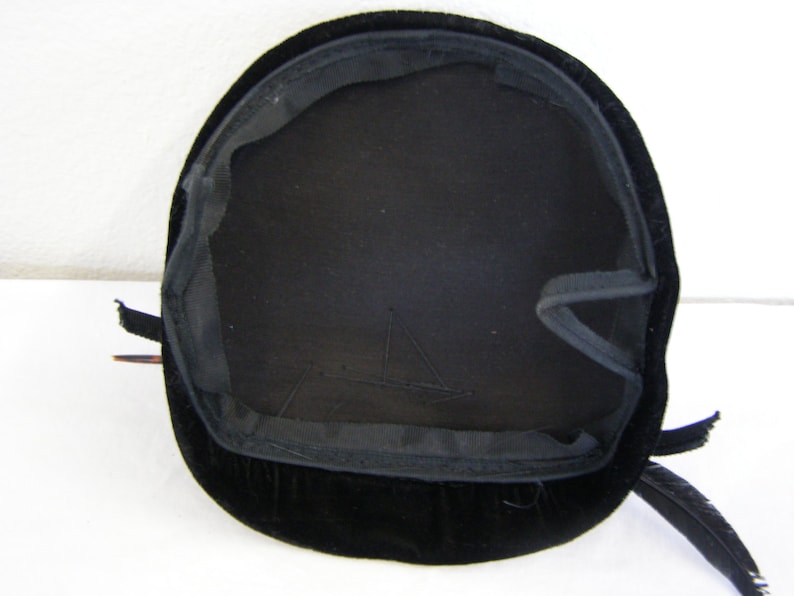 Vintage 1950's women's millinery hat. Black velvet or velour cocktail style with feather and silk flower. image 3