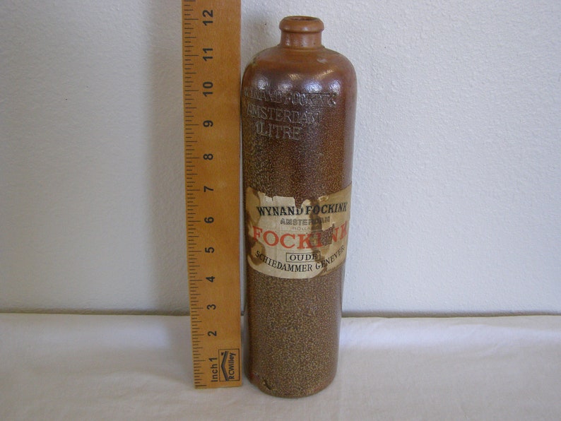 Antique Wynand Fockink Amsterdam Stoneware Gin Bottle. 1 Liter with partial label. image 7