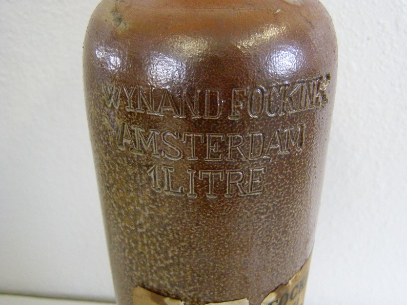 Antique Wynand Fockink Amsterdam Stoneware Gin Bottle. 1 Liter with partial label. image 2