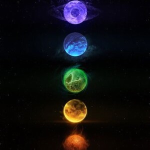 May include: A series of seven glowing orbs in a rainbow color sequence, from purple to red, against a dark starry background.