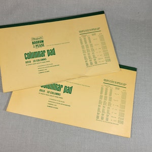 May include: Two yellow and green columnar pads with the text "Boorum & Pease" and "Columnar Pad 8910 10 Columns" printed on the front. The pads are made of good quality bond paper and have numbered columns.