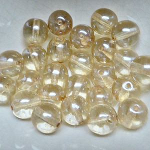 25 Lustered Champagne 6mm Glass Beads