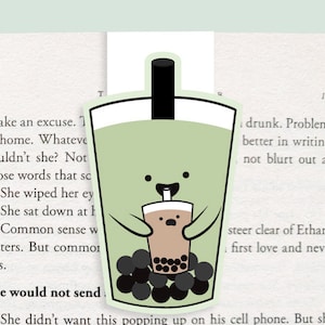 May include: A green and white cartoon illustration of a boba tea cup with a black straw. The boba tea cup is holding a smaller brown boba tea cup with black boba pearls. The text "She would not send" is visible in the background.