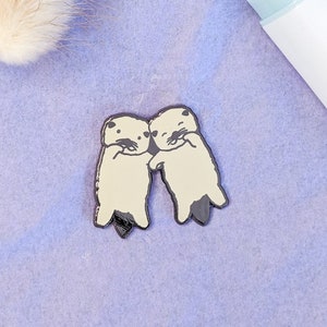 Otters Enamel Pin