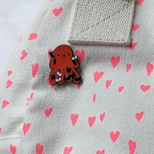 Octopus and Books Enamel Pin