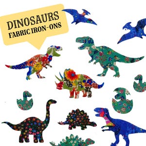 May include: A collection of fabric iron-on dinosaur patches featuring various floral patterns in blue, green, red, and black. The set includes multiple dinosaur species and eggs, with a yellow speech bubble containing the text DINOSAURS FABRIC IRON-ONS.