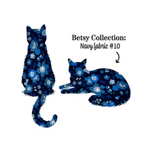 May include: Two cat silhouettes featuring a navy blue fabric pattern with light blue and white floral motifs. The text "Betsy Collection: Navy fabric #10" is printed above the reclining cat with a small arrow pointing toward the fabric.