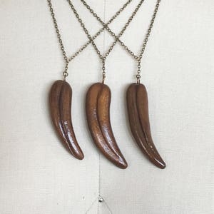 Daenerys dragon tooth necklace discount