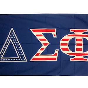May include: A blue flag with the Greek letters Delta, Sigma, and Phi in white with red and white stripes resembling the American flag.