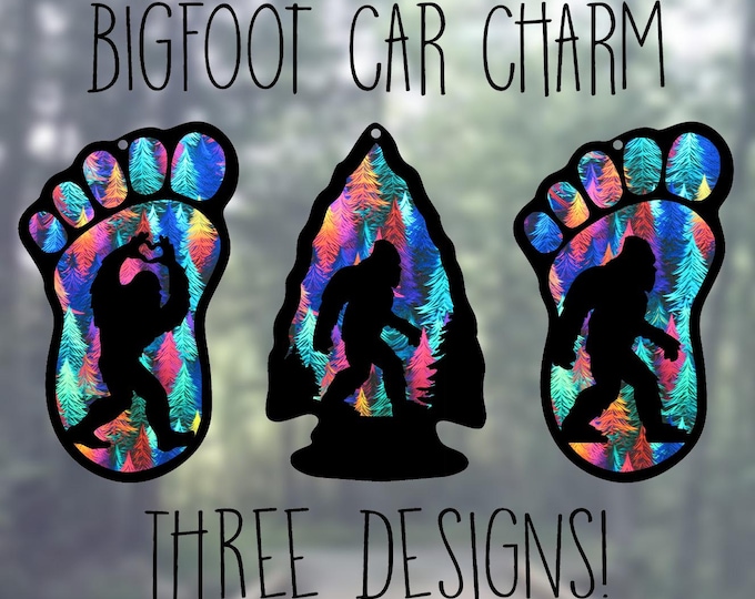 Featured listing image: Car Rearview Mirror Suncatcher Charm | Bigfoot Heart Hands | Bigfoot in Arrowhead | Bigfoot Print | Wispy Tree Forest