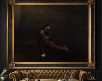 May include: A dark, moody painting in a gold frame depicting a woman in a dark dress sitting on a dark background.