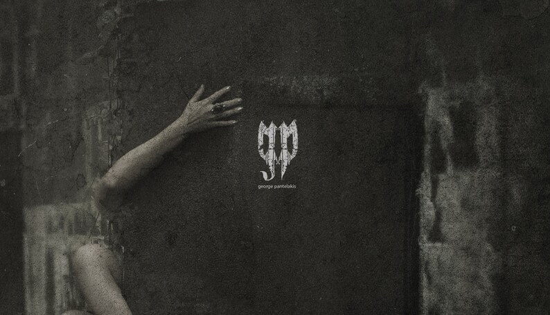May include: A black and white image of a hand reaching out to touch a wall. The wall has a white logo with the text "george pantazidis" underneath.
