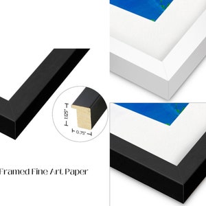 May include: Black wood frame with a 1.125 inch wide mat and a 0.75 inch thick frame. The frame is shown with a white mat and a white background. "Framed Fine Art Paper" is printed below the frame.