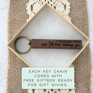 May include: Wooden keychain with the text "I choose you and I'll keep choosing you". Each keychain comes with a free gift box ready for gift giving.