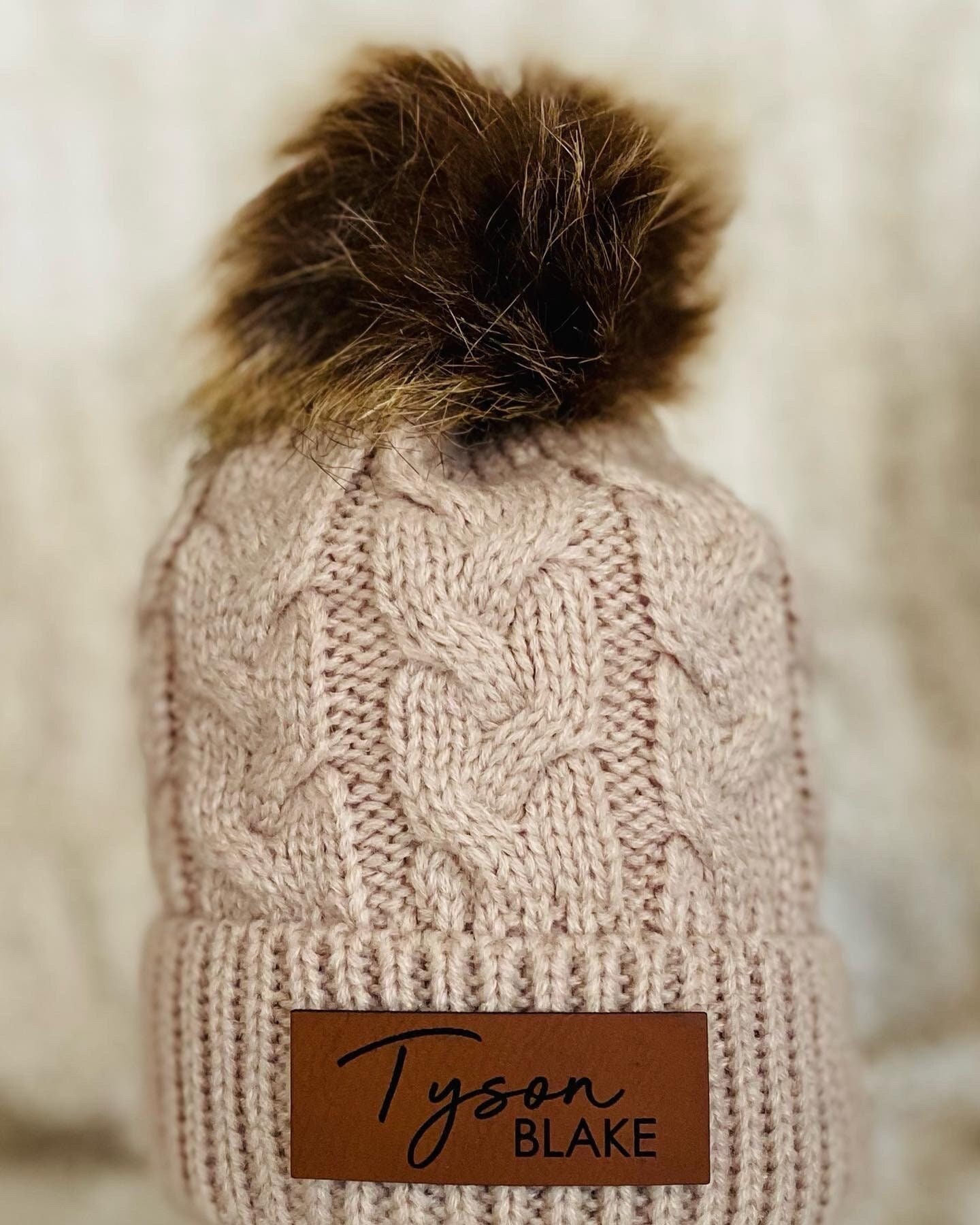beanie with puff on top