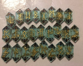 Green and gold resin elder Futhark rune set