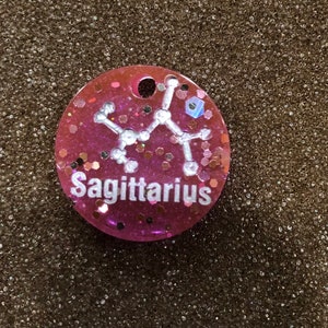 Glitter zodiac keychains image 5