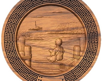 Boy with dog on dock cribbage board with pegs