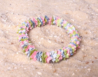 Lei de flores hawaianas en miniatura a escala 1:6