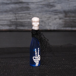 Spooky Miniature Skull Bottle for Halloween