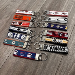 NFL Key Chains (Chiefs, Niners, Giants, Jets, Bills, Patriots, Cowboys, Commanders, Eagles, Dolphins, Ravens, Packers, Steeler, Lions)