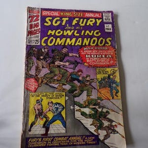 May include: A comic book cover featuring a group of soldiers in action. The cover is titled "Sgt. Fury and His Howling Commandos" and features the text "Special King Size Annual!" and "#1 1965".
