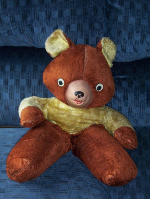 teddy bear with plastic face