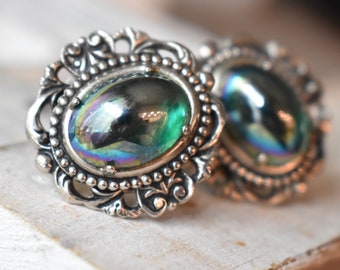 Mystic green art glass cabochon clip on earrings Whitchcore earlobe silver tone clip earrings Oval Gothic earrings