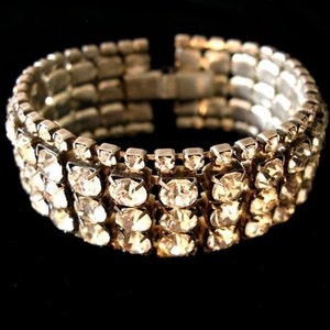 Vintage rhinestone bracelet 1980&#39;s or earlier, large faceted prong set stones, silver toned metal, dazzling, glamorous.