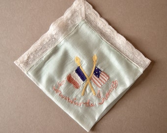 Vintage handkerchief, Souvenir de France, WWI, pale blue silk, machine embroidered with American and French flags, lace trim