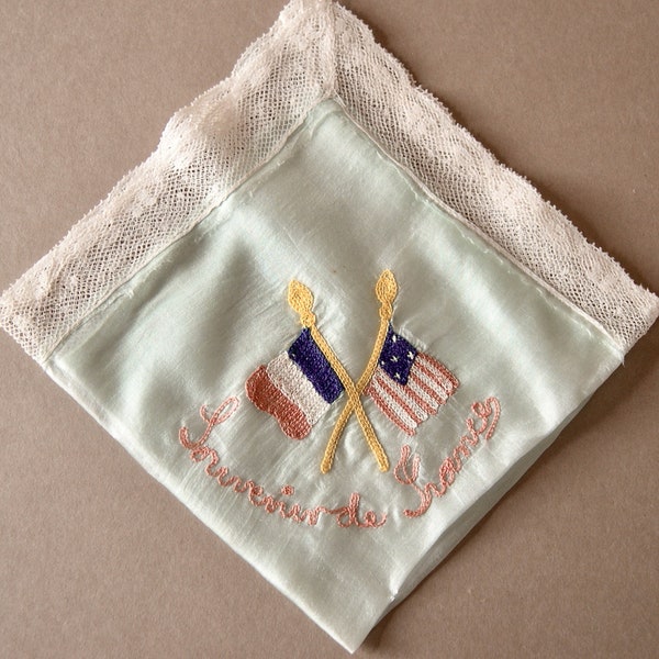 Vintage handkerchief, Souvenir de France, WWI, pale blue silk, machine embroidered with American and French flags, lace trim