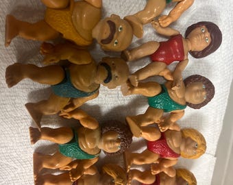 Lot of 9 1987 hasbro cavemen play toys.  in played with condition, 80s 90s nostalgia